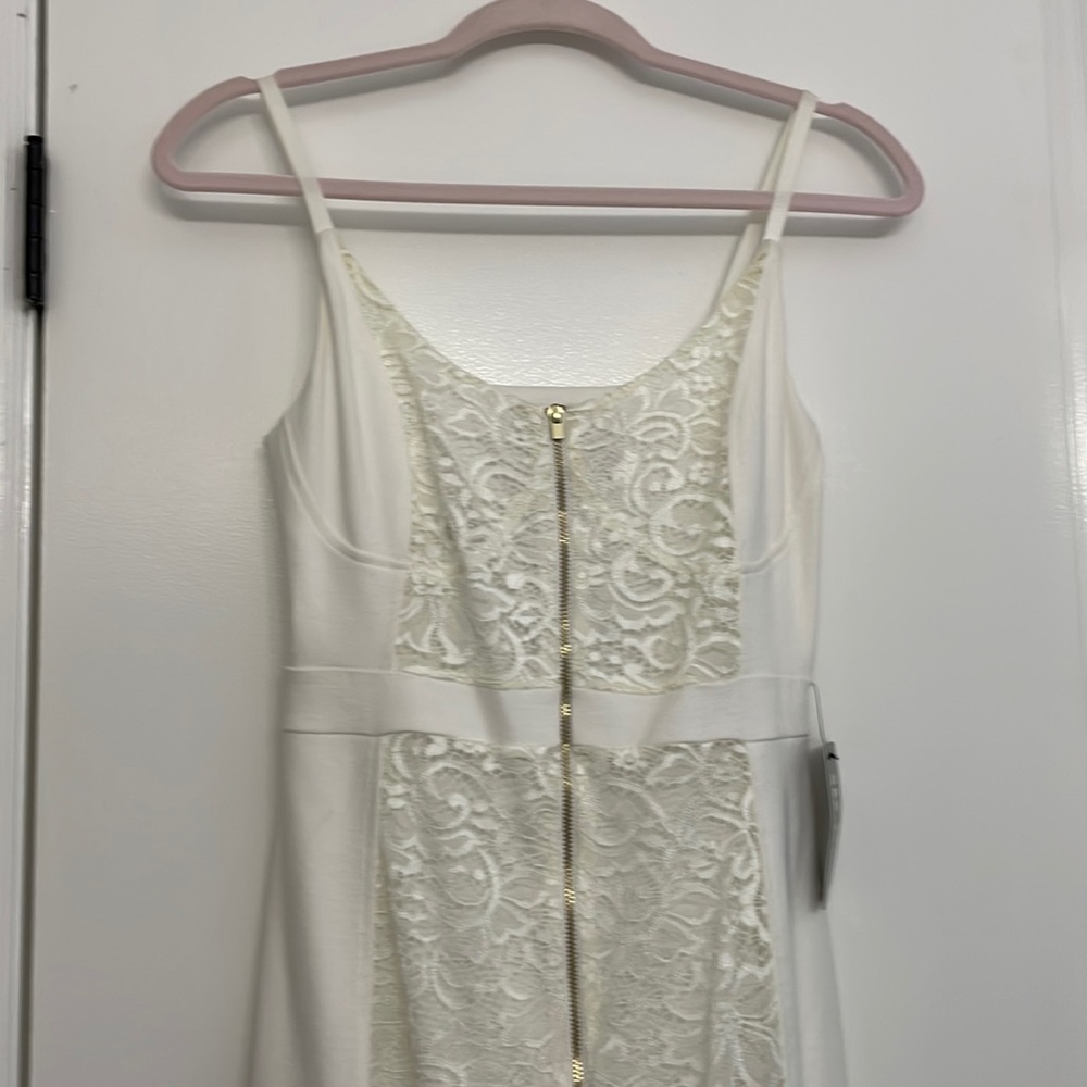 New with Tags. Never worn white lace Express dress
